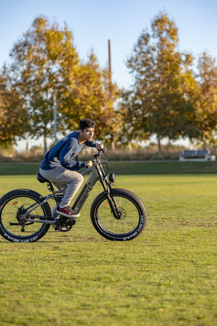 Man Riding Bike at Park